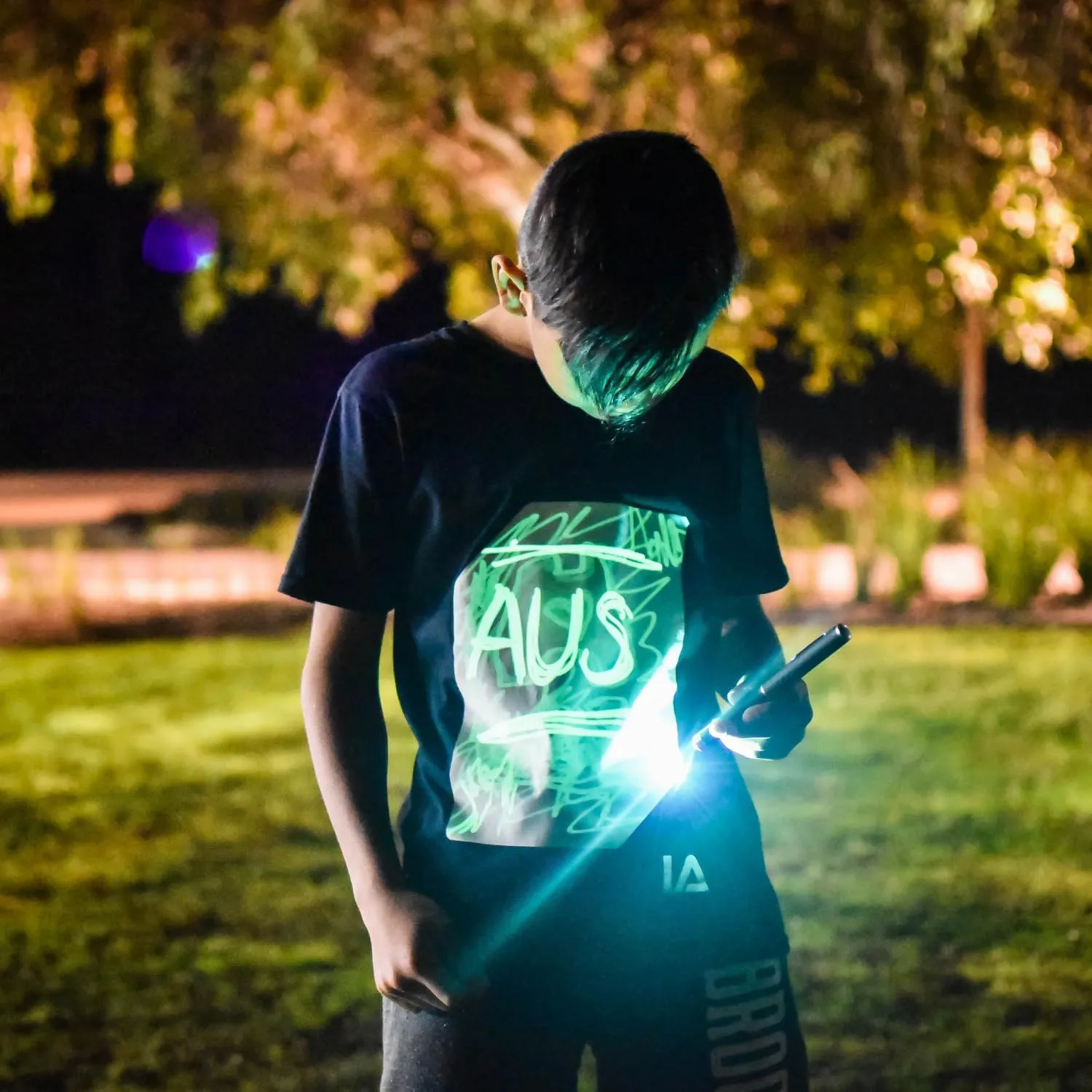Illuminated Apparel Original Interactive Glow in The Dark T-Shirt - Fun for Birthday Parties & Festivals